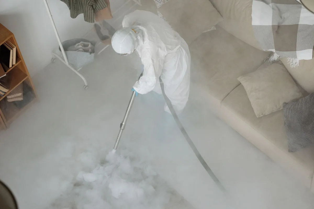 Biohazard cleanup technician in protective equipment, Rockville, CT